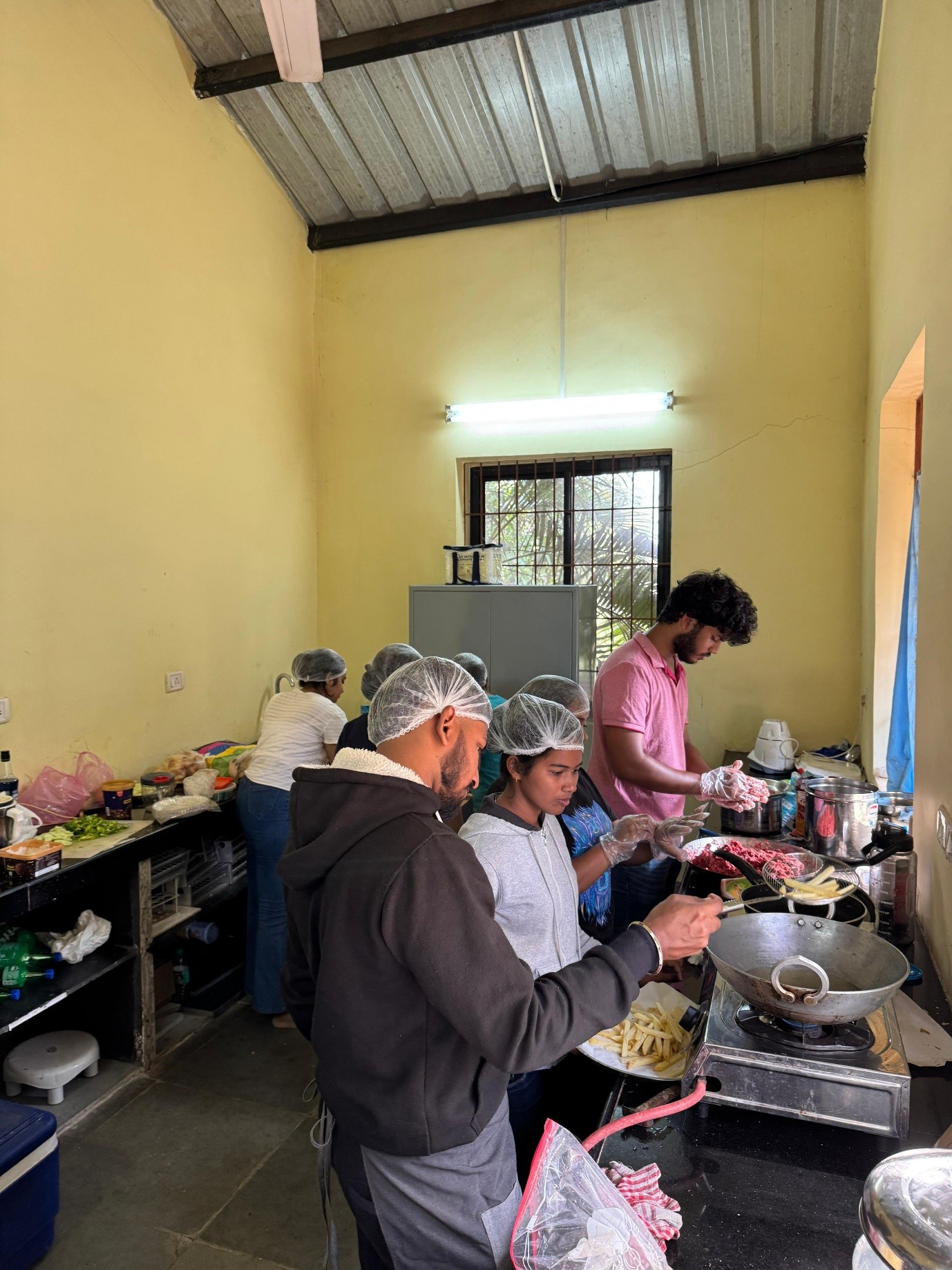 Final year module student preparing food products